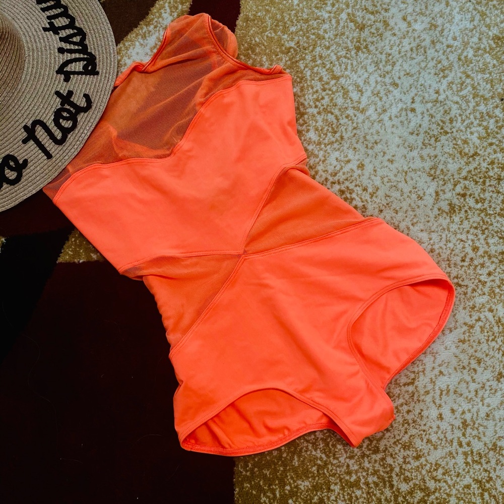 One Rad Girl line by Dress the Population
Neon Orange Mesh Bodysuit size M NWOT